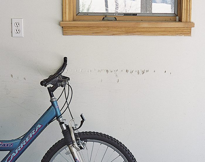 garage wall with abuse-resistant drywall