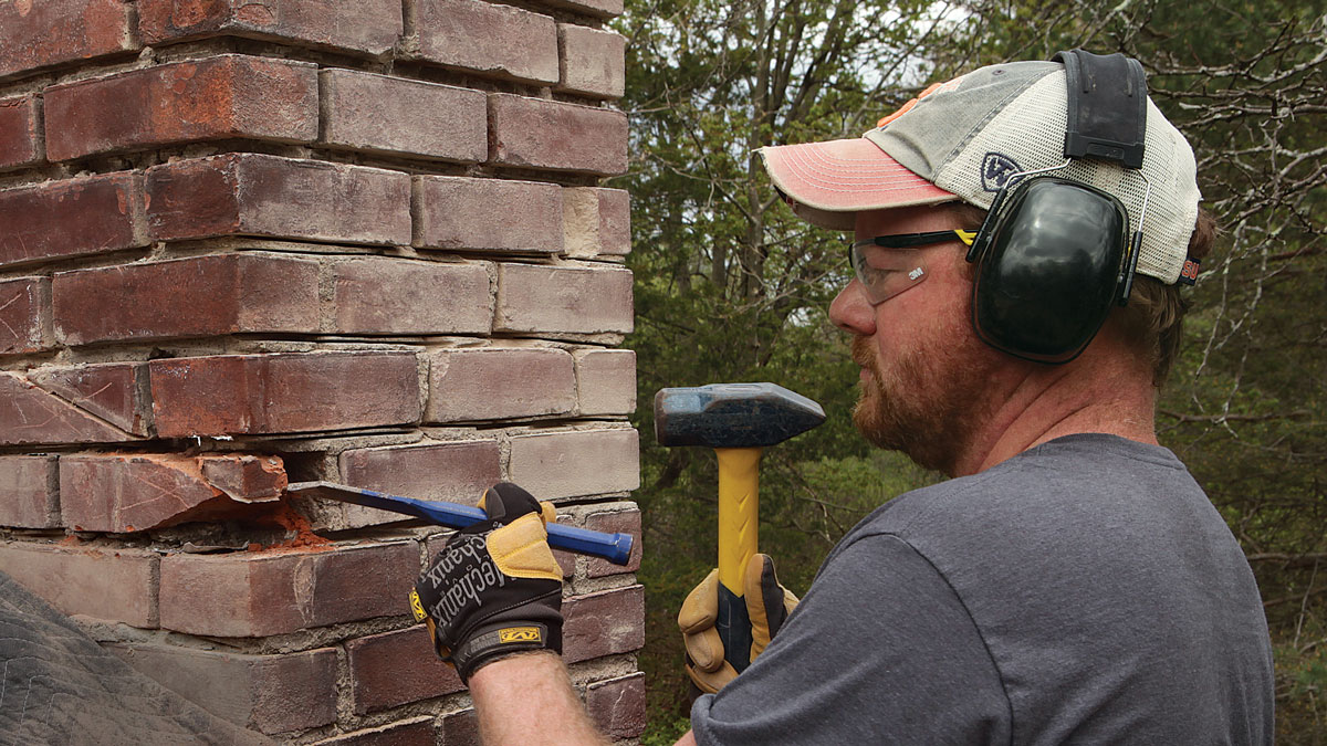 Crushed corner. Broken bricks on outside corners can be easily removed with a hammer and chisel rather than resorting to power tools. Hand tools alone generally take too long for field bricks, though.