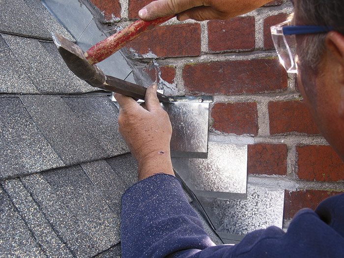 Counterflashing held in place by masonry nails.jpg
