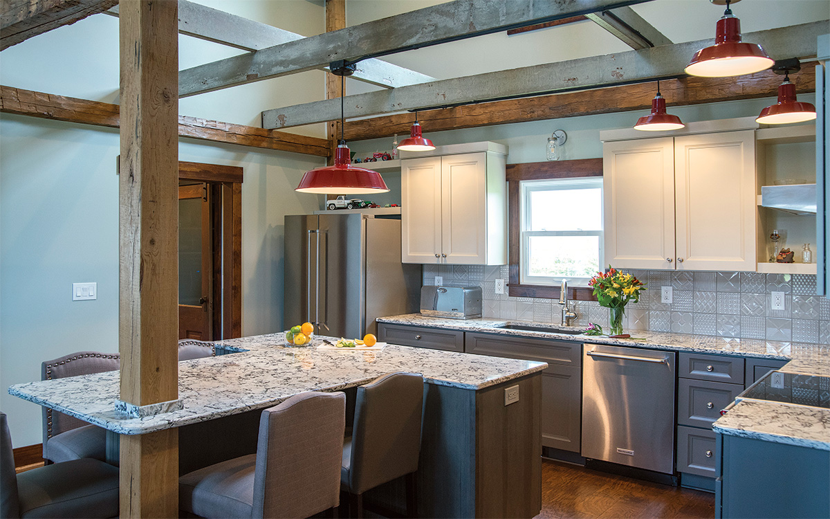 old farmhouse kitchen with timber-frame beams