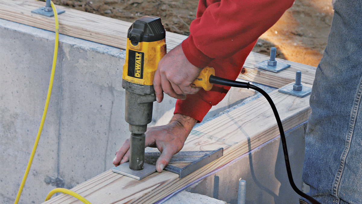 If large square washers are used on the foundation bolts, align them with a square so they won’t later interfere with the rim joists. Don’t overtighten the nuts!