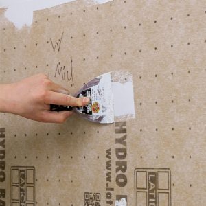 Walls are easy. Foamboard cuts with a utility knife and attaches with specialized screws. Run a bead of sealant between each panel and trowel more over the seams, then coat fasteners and seal around penetrations.