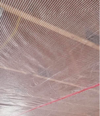 Polyethylene sheeting installed on a ceiling