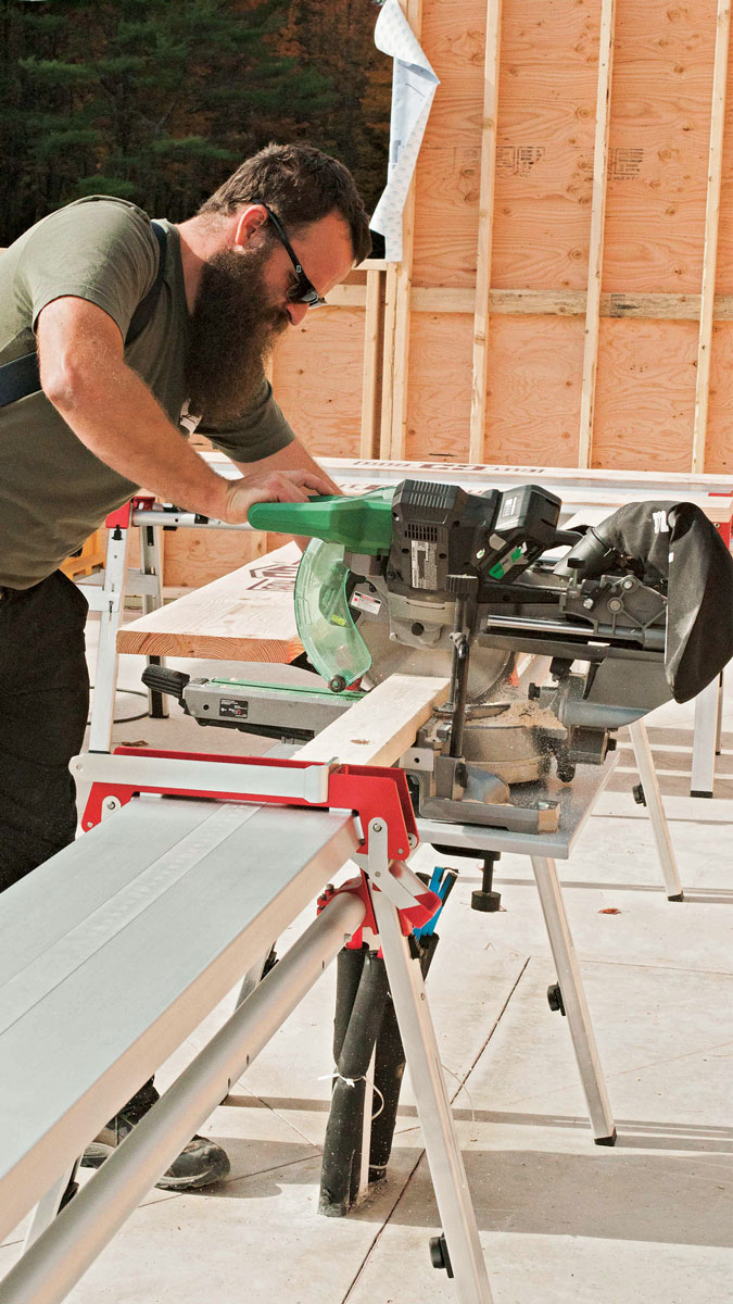 Tape on top. The Cut Hub has a wide aluminum top with a built-in tape measure that works with the adjustable stop. Two of these sawhorse modules connect with telescoping aluminum rails to create a mount for a miter saw.