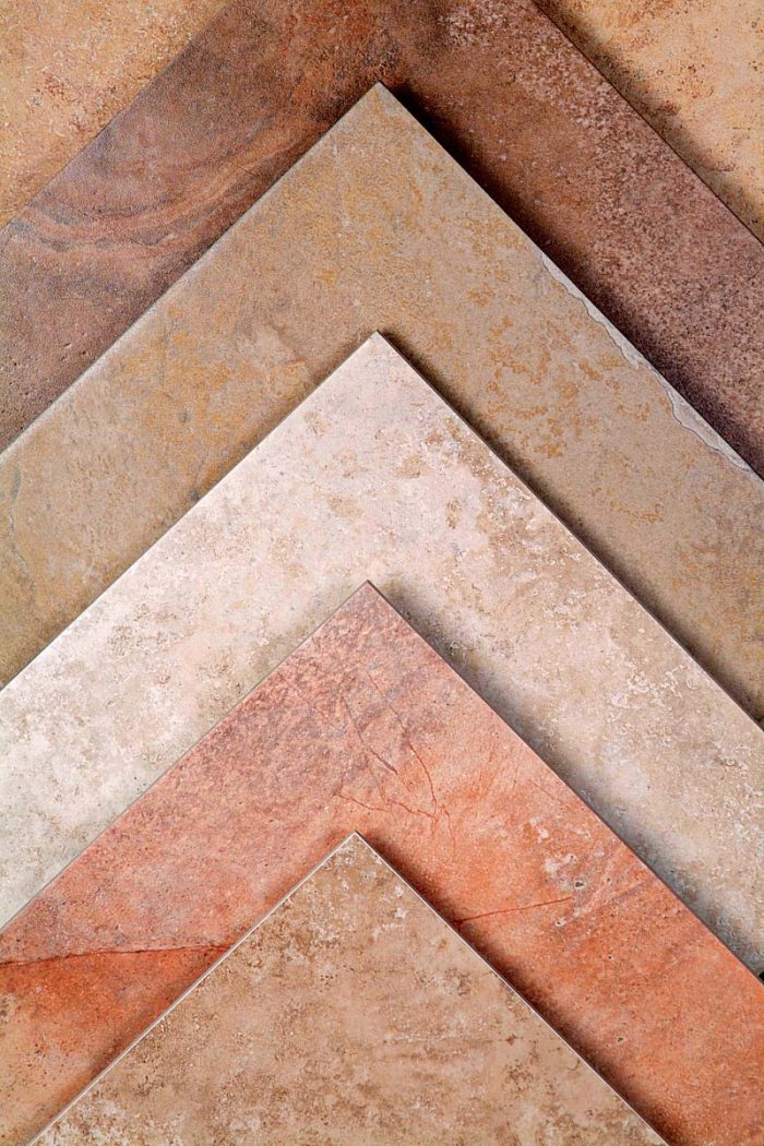 Ersatz stone tiles made of porcelain come in a wide array of colors.