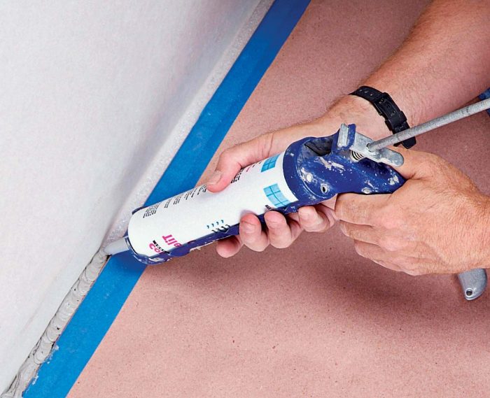 Caulk is used to fill expansion joints around a room.