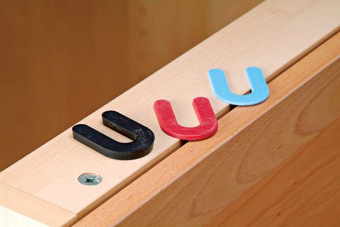 U-shape spacers are used to level plywood under countertops and come in different thicknesses.
