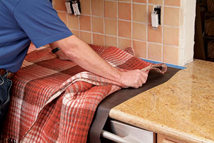 Cover countertops with towels or blankets for protection.