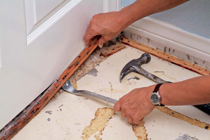 Remove any nails that pull out of the tack strip and any staples from the floor.