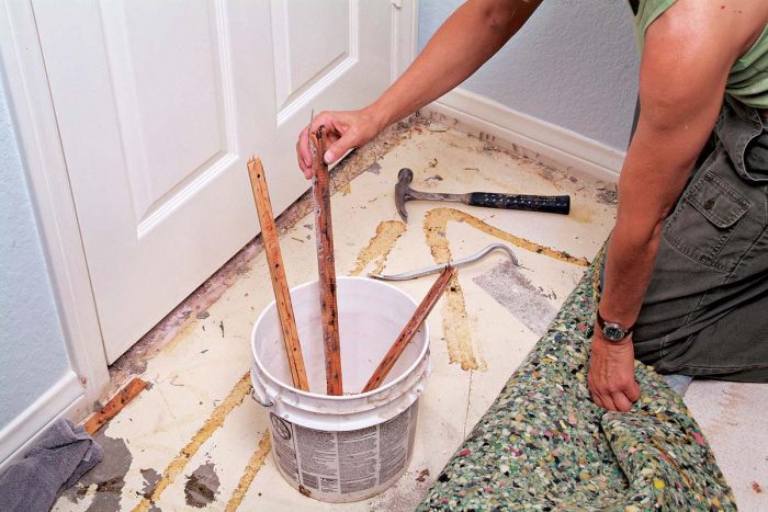 Store sharp carpet tack strips in a bucket to prevent injuries.