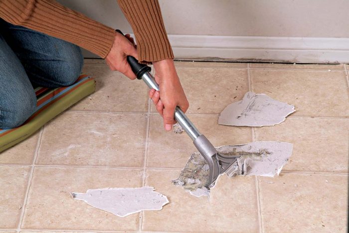 Scrape the flooring from the concrete substrate.