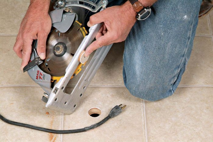 Set your circular saw to the depth of the subfloor.