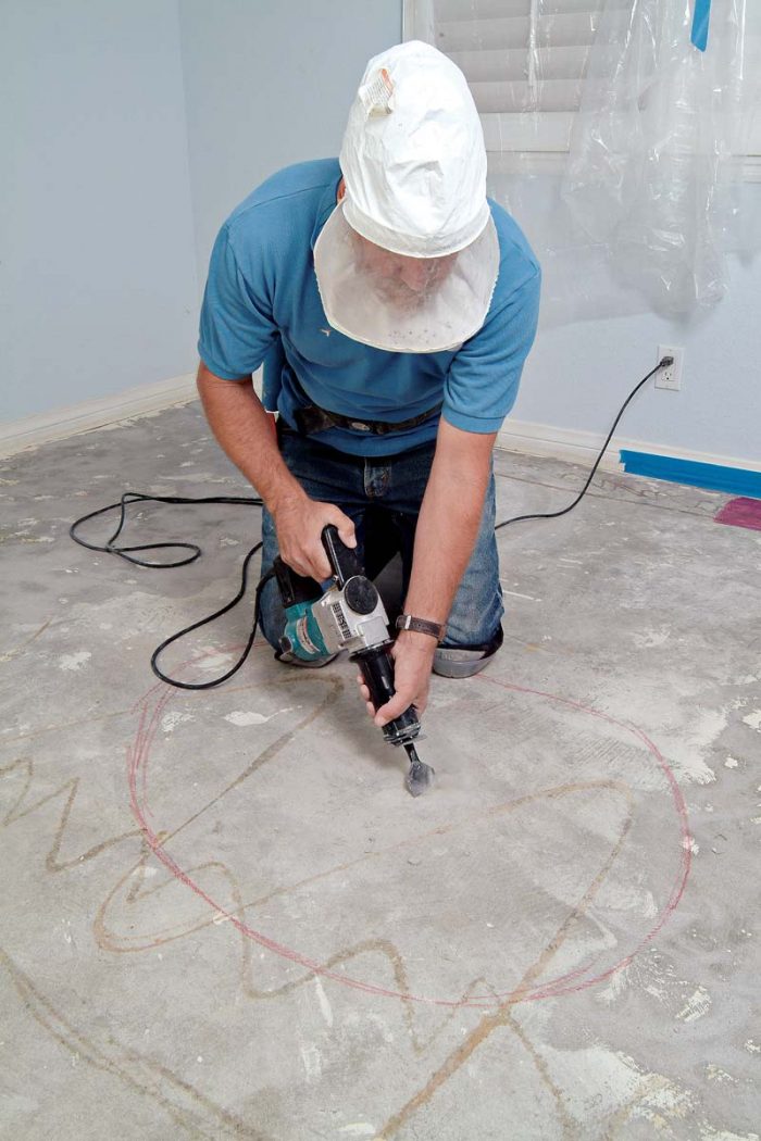 Use a chipping hammer to remove excess concrete from high spots or small hills.