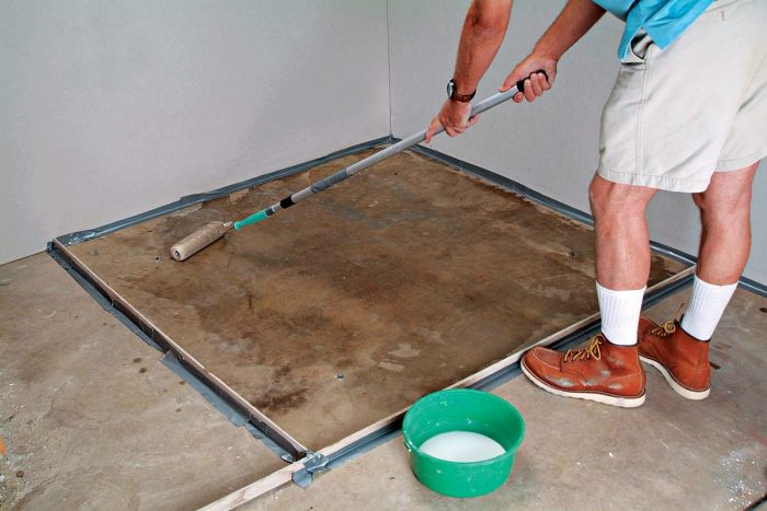 Apply primer to the floor with a roller and allow it to dry.