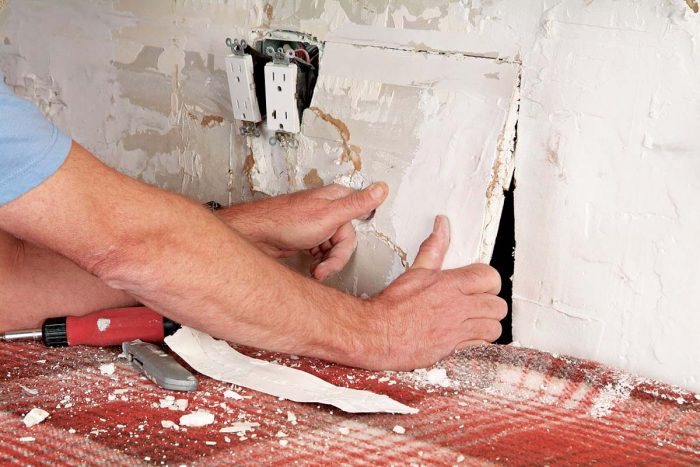 Remove damaged section of wall by pulling it out carefully.