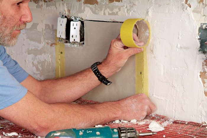 Tape the drywall joints with self-adhesive mesh tape.