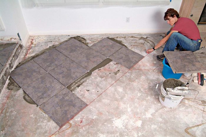 Additional chalklines serve as a guide to keep subsequent rows of tile straight.