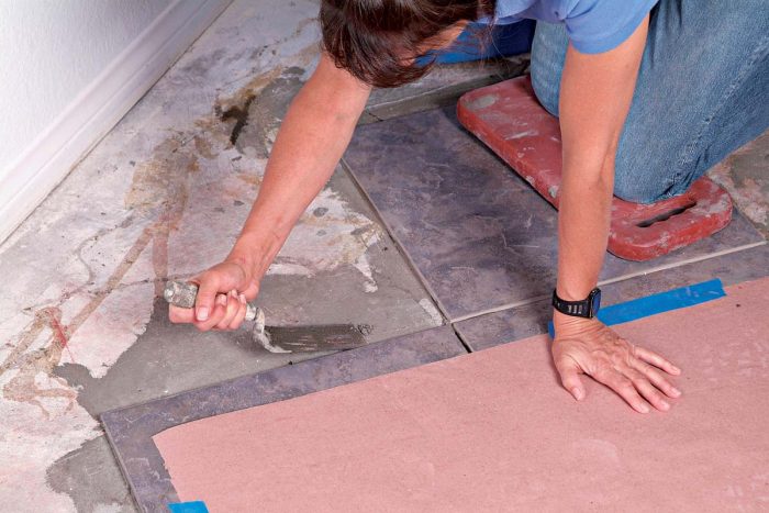 Clean up any dried thinset you may have left from the previous day before you attempt to fit the cut tiles.