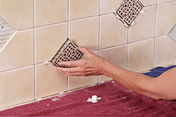 Set the deco tiles into your backsplash while the thinset is still pliable.