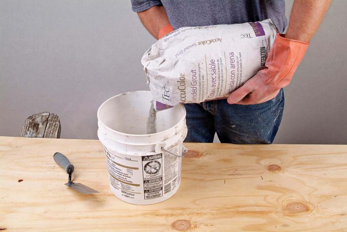 Always pour dry grout powder into the liquid, not vice-versa.