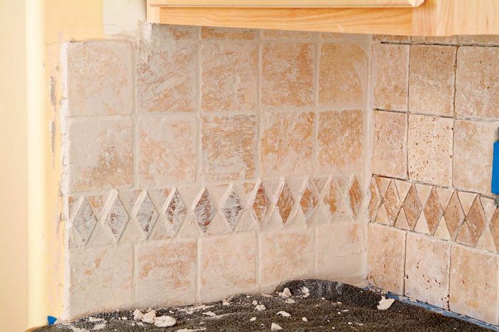 Grout joints should be filled and tile surfaces clean.