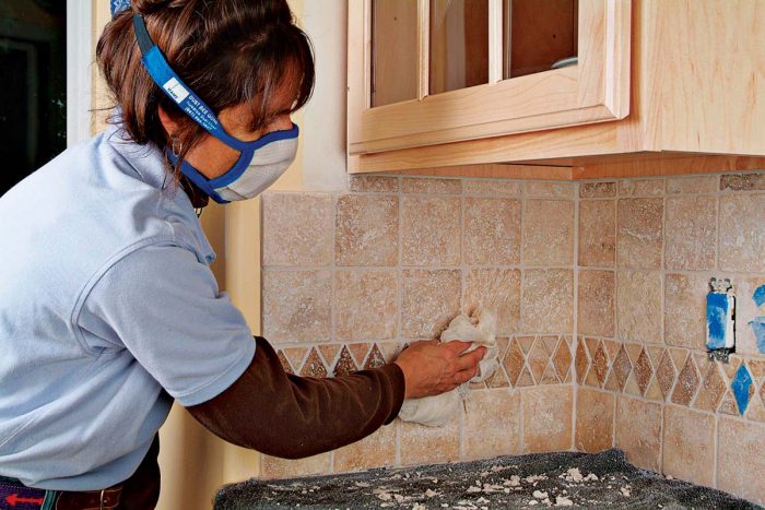 Remove any light grout haze from tile surface with a clean, dry cheesecloth.