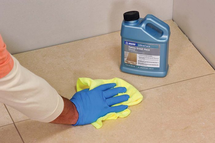 Additionally, wipe any remaining epoxy film off the surface with epoxy haze remover.