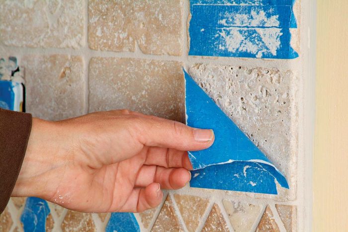 Remove tape to expose the holes and texture of natural stone.