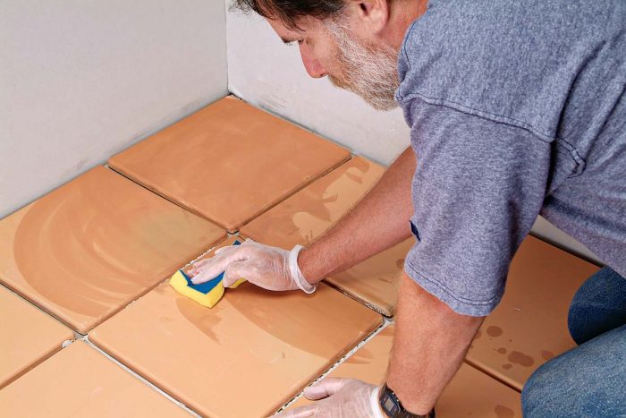 Dampen the installation with a clean sponge before grouting.