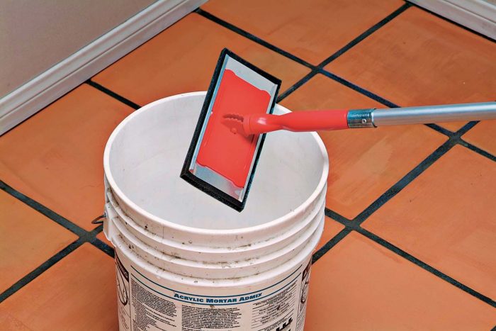 You may use a pad-type applicator in lieu of a brush or roller to apply floor-finishing products.