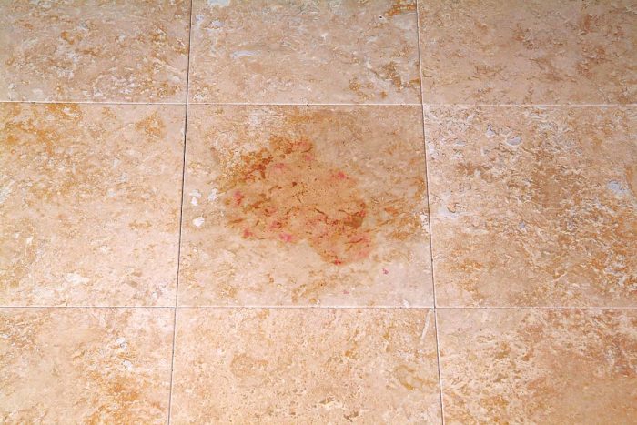 Stains in stone or porous tiles require a bit more work to remove.