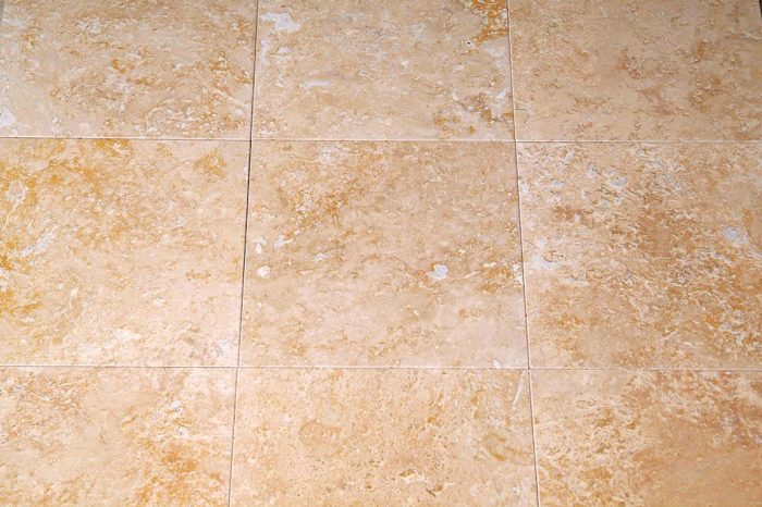 Using a poultice can return your stone floor back to its original beauty. Be sure and reapply sealer.