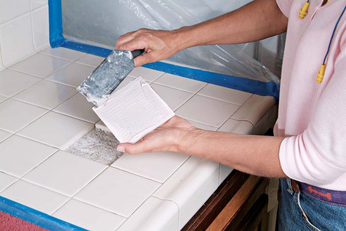 Apply thinset to the back of your replacement tile, especially the corners.