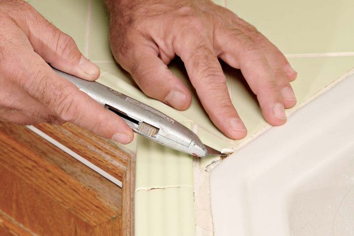 Check for any loose grout and lift it out carefully.