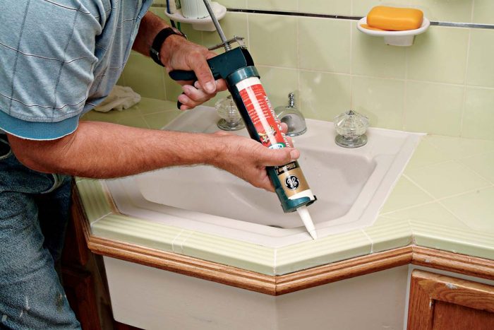 Caulk any areas that typically experience movement, as between sink and tile.