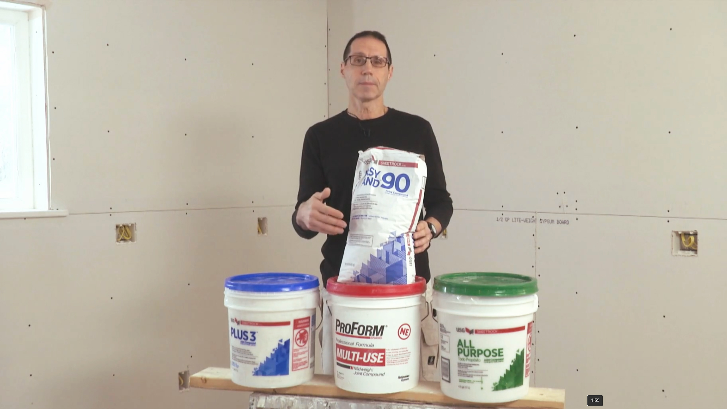 Myron displays a set of drywall compounds