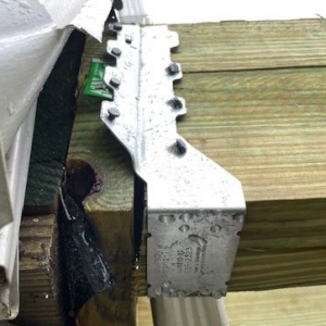 Image of a piece of hardware used incorrectly on a deck