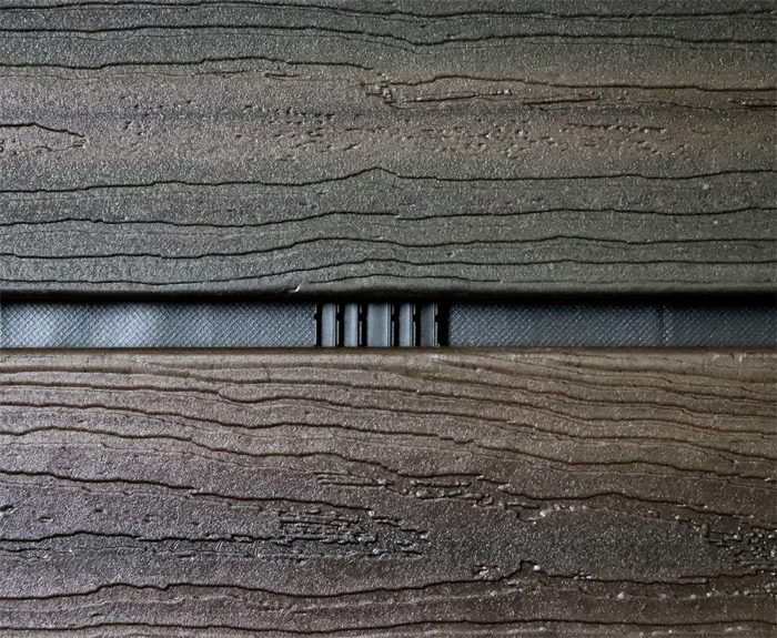 Image of open-gapped wood siding with a furring strip visible between