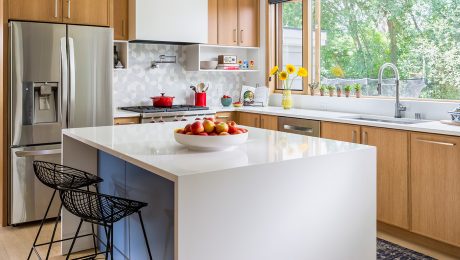 A bright kitchen white white engineered quartz countertops