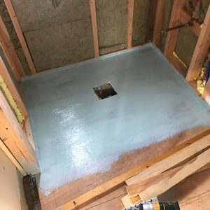 Colins-prepped-subfloor-at-shower
