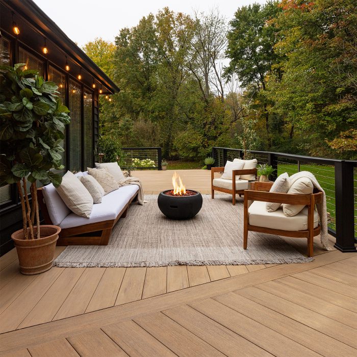 Weathered teak composite decking with furniture on top