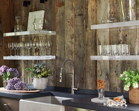 Open shelving in the kitchen of a connecticut barn