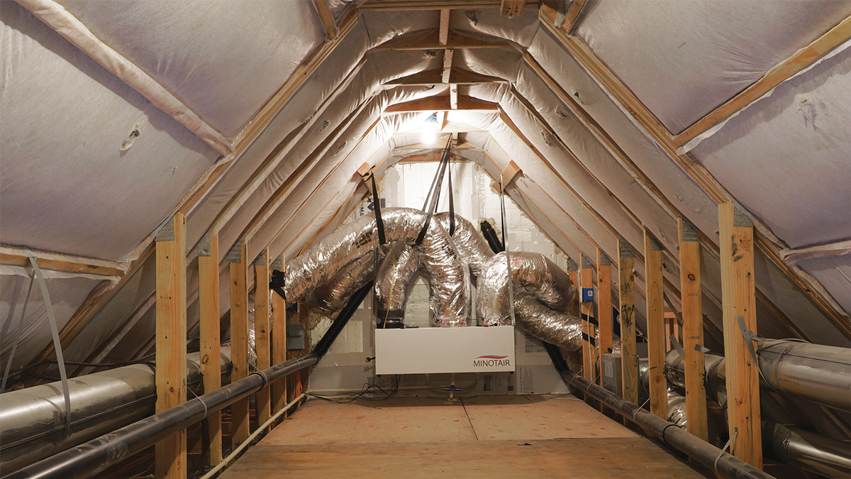 smart mechanicals Insulation in the roof trusses creates a conditioned attic space for mechanicals and ductwork. The homes have Minotair units, which combine heating, cooling, ventilation, humidity control, and HEPA-level filtration in one compact, superefficient unit.