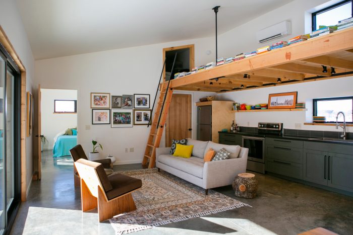 View of the living area, loft, and kitchen