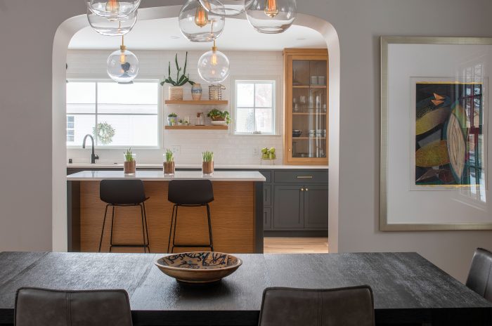 View from dining room to kitchen with arched openings