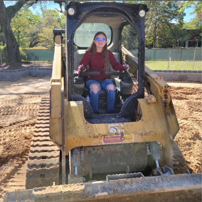 Bryan's daughter helping on-site