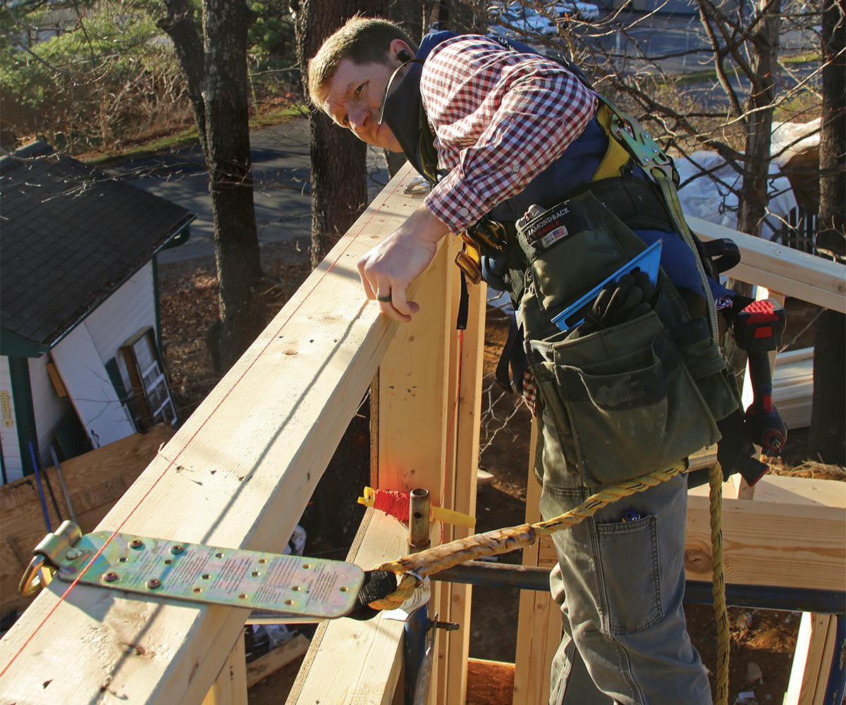 using a stringline to check wall framing is straight