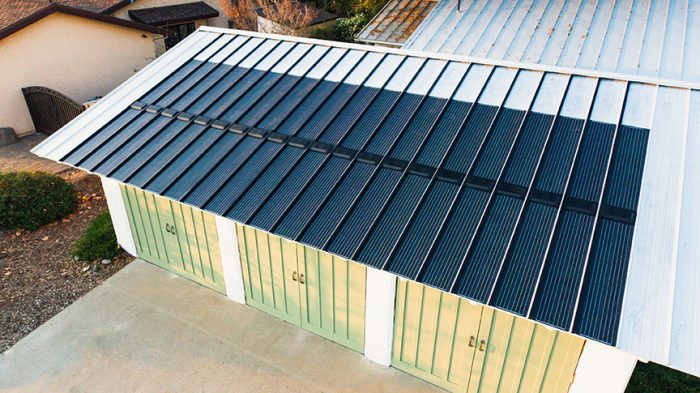 Solar panels on a garage with a metal roof
