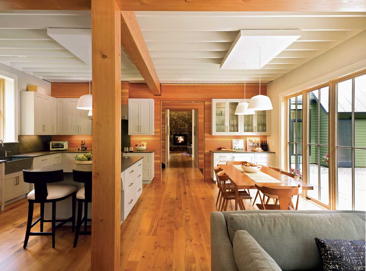 Wall to wall Two different wall treatments lend versatility and warmth to the space. Painted drywall serves as a backdrop for artwork, while Douglas-fir planking with a clear satin finish captures the cabin vibe.