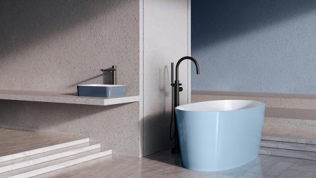 Blue freestanding tub and matching blue vessel sink